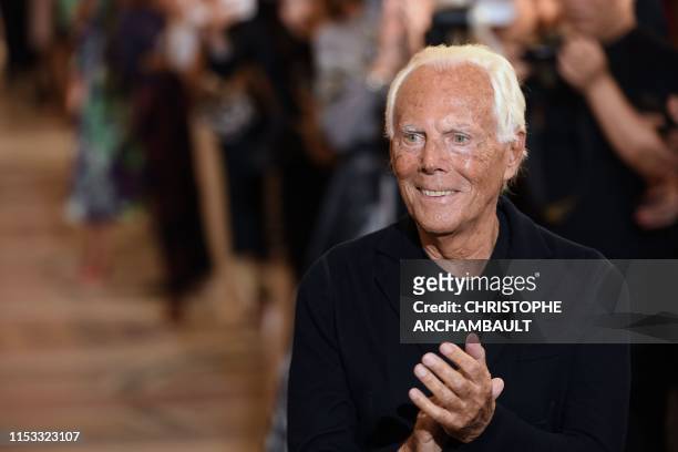 Italian fashion designer Giorgio Armani acknowledges the audience at the end of his Women's Fall-Winter 2019/2020 Haute Couture collection fashion...