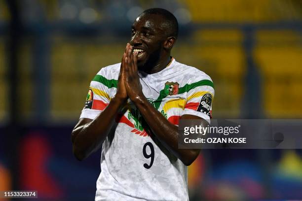 Mali's forward Moussa Marega reacts after a missed shot during the 2019 Africa Cup of Nations Group E football match between Angola and Mali at the...