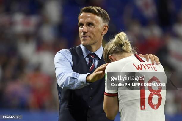 England's coach Phil Neville comforts England's forward Ellen White at the end of the France 2019 Women's World Cup semi-final football match between...