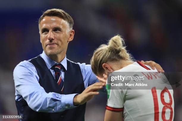 England Head Coach Phil Neville consoles an emotional Ellen White during the 2019 FIFA Women's World Cup France Semi Final match between England and...