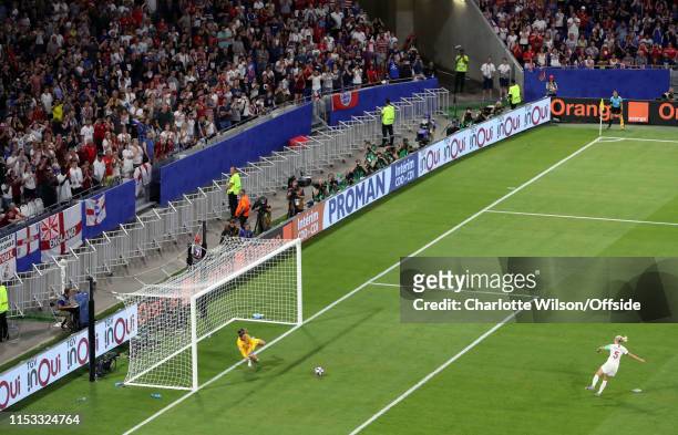 Goalkeeper Alyssa Naeher saves the penalty of Steph Houghton of England during the 2019 FIFA Women's World Cup France Semi Final match between...