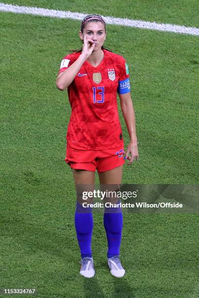 Alex Morgan of USA celebrates scoring their 2nd goal by pretending to drink a cup of tea during the 2019 FIFA Women's World Cup France Semi Final...