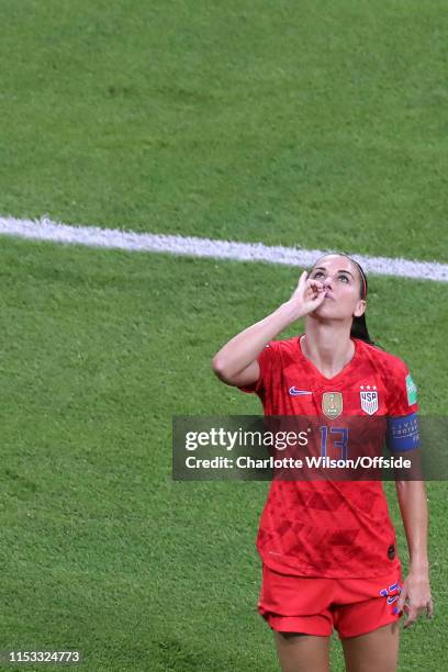 Alex Morgan of USA celebrates scoring their 2nd goal by pretending to drink a cup of tea during the 2019 FIFA Women's World Cup France Semi Final...