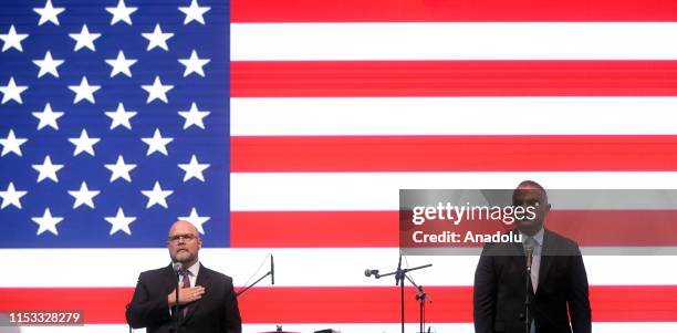 Charge dAffaires at the U.S. Embassy in Ankara Jeffrey M. Hovenier and Turkish Culture and Tourism Minister Mehmet Nuri Ersoy are seen during a...