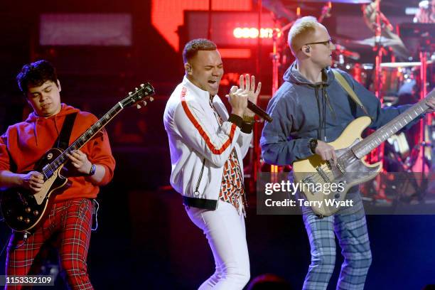 Tauren Wells performs on stage during the 7th Annual K-LOVE Fan Awards at The Grand Ole Opry House on June 2, 2019 in Nashville, Tennessee.