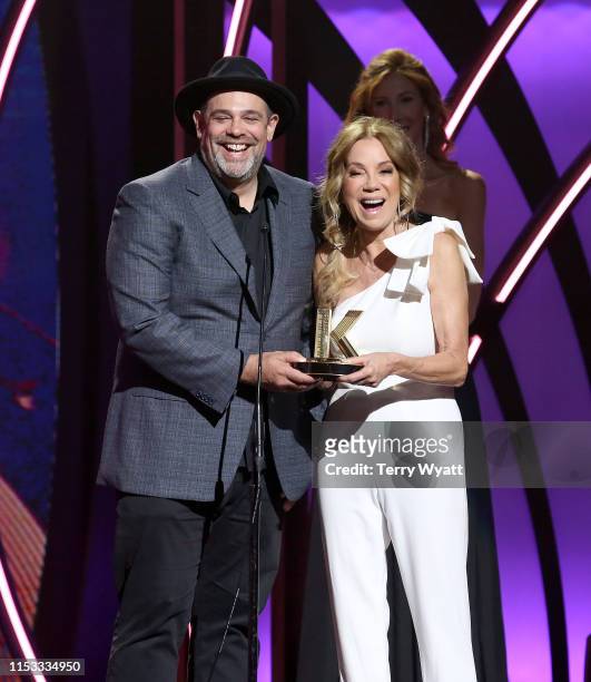 Rabbi Jason Sobel accepts an award on stage from Kathie Lee Gifford during the 7th Annual K-LOVE Fan Awards at The Grand Ole Opry House on June 2,...