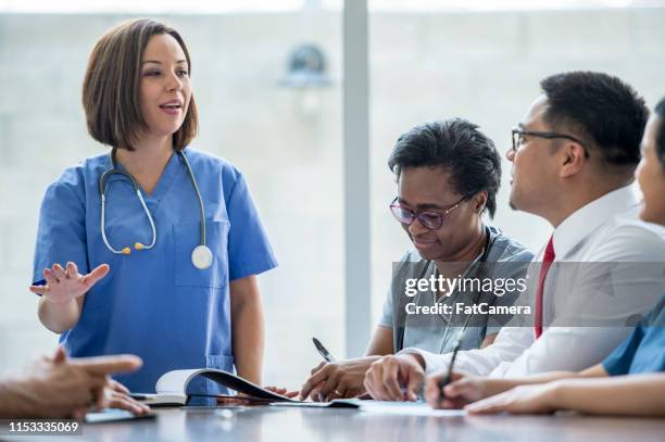 medical doctor or nurse - resident stock pictures, royalty-free photos & images