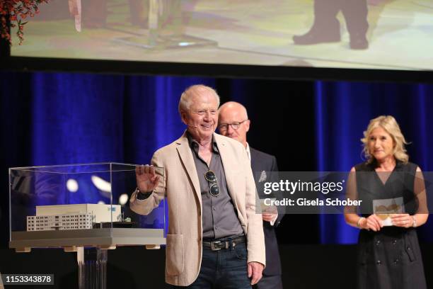 Director Wolfgang Petersen, Dr. Christian Frankenstein and Iris Ostermaier during the Bavaria Film Reception "One Hundred Years in Motion" on the...