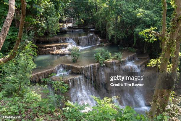 level 4 of huay mae khamin waterfall. - tim bewer fotografías e imágenes de stock