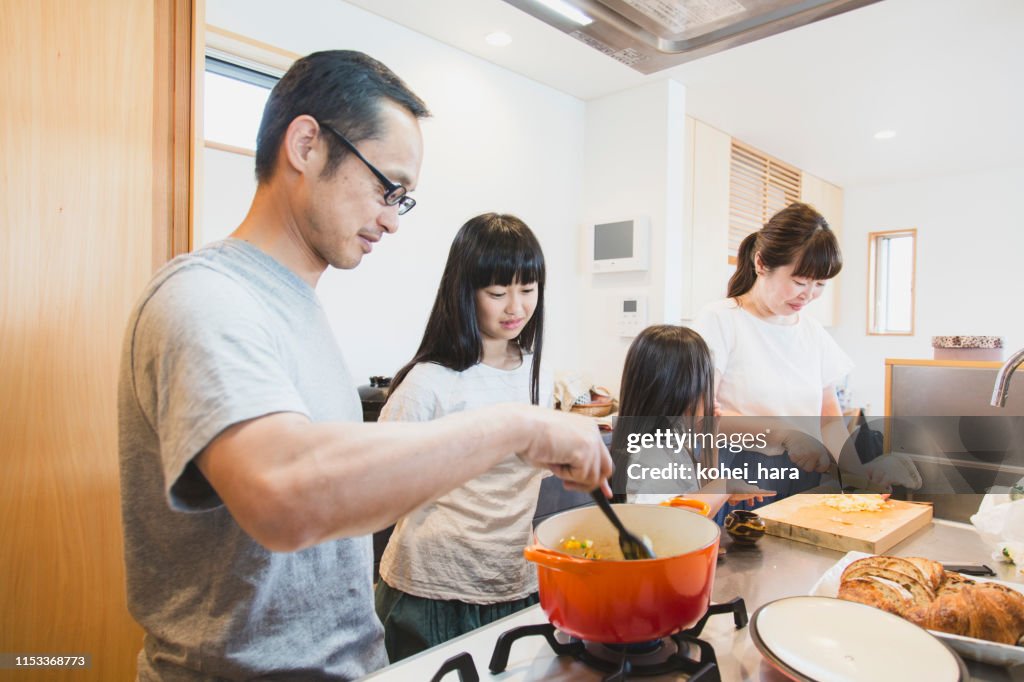 Family cooking in the kitchen together