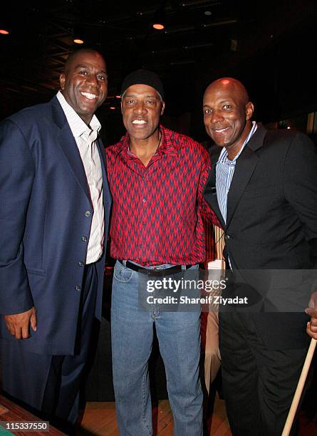 Earvin "Magic" Johnson, Julius Erving and Clyde Drexler