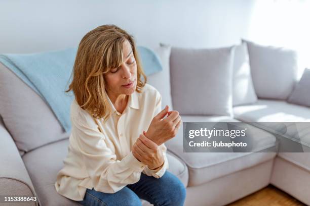 senior in pain - rheumatism stock pictures, royalty-free photos & images