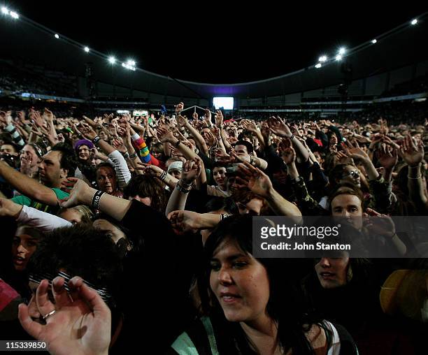 Fans at the Australian leg of the Live Earth series of concerts, at Aussie Stadium, Moore Park on July 7, 2007 in Sydney, Australia. Launched by...
