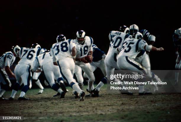 Los Angeles, CA LA Rams quarterback Roman Gabriel, Baltimore Colts at Los Angeles Rams, NFL gameplay, Los Angeles Memorial Coliseum.