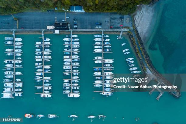 top looking down at tutukaka marina reserve. - whangarei heads stockfoto's en -beelden