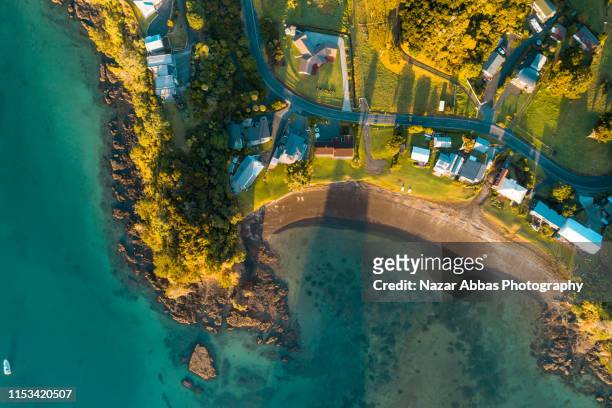 aerial view of properties in tutukaka coast, whangarei. - northland region stock pictures, royalty-free photos & images