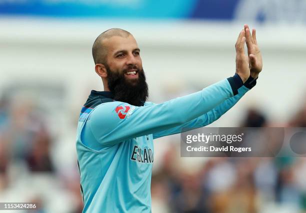 Moeen Ali of England celebrates after taking the wicket of Babar Azam during the Group Stage match of the ICC Cricket World Cup 2019 between England...