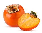 Persimmon fruit and one cut in half