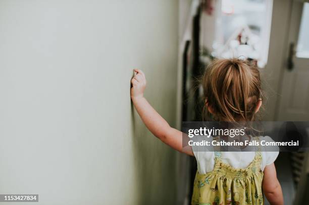 toddler - girl looking down stock pictures, royalty-free photos & images