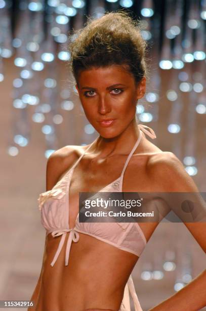 Michelle Alves wearing Rosa Cha Spring 2006 during Olympus Fashion Week Spring 2006 - Rosa Cha - Runway at Bryant Park in New York City, New York,...