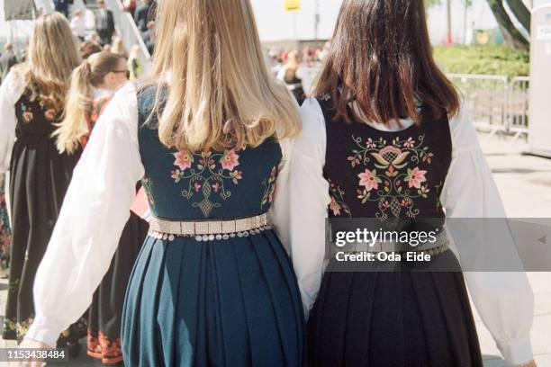 norwegian national day - girls wearing bounds - 17th may stock pictures, royalty-free photos & images