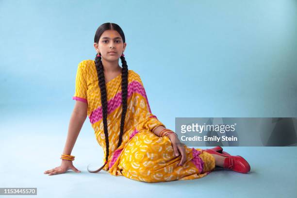 Portrait of a young Indian girl sitting