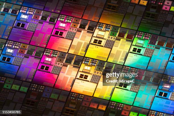 iridescent silicon computer wafer - wafer stock pictures, royalty-free photos & images