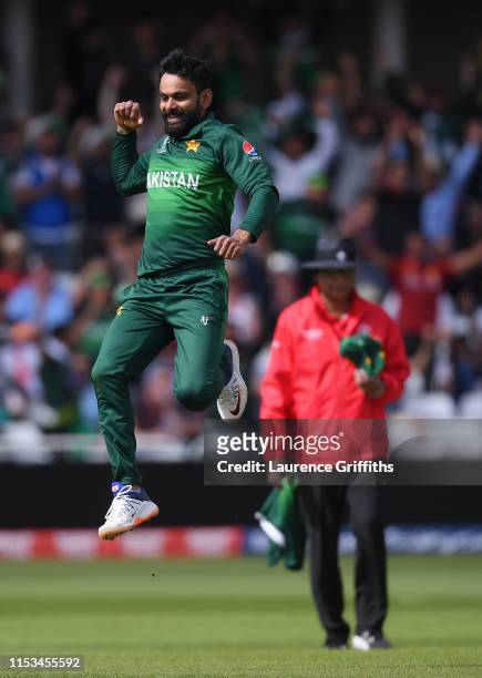Mohammad Hafeez of Pakistan celebrates the wicket of Eoin Morgan of England during the Group Stage match of the ICC Cricket World Cup 2019 between...