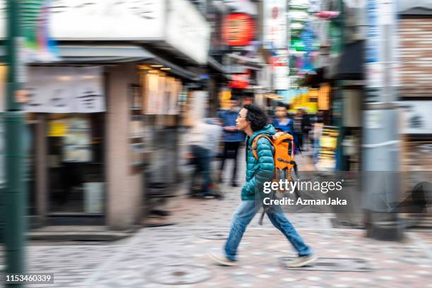 Tokyo Backpacking 154 Walking Briskly Stock Photos, High-Res Pictures, and Images - Getty ...