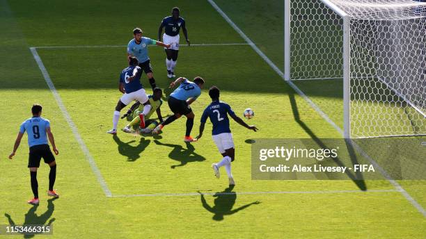 Ronald Araujo of Uruguay scores his team's first goal during the 2019 FIFA U-20 World Cup Round of 16 match between Uruguay and Ecuador at Arena...