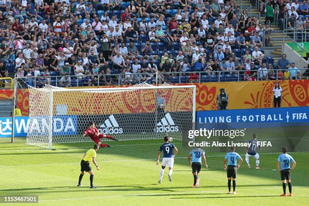 Alexander Alvarado of Ecuador scores his team's first goal during the 2019 FIFA U-20 World Cup Round of 16 match between Uruguay and Ecuador at Arena...