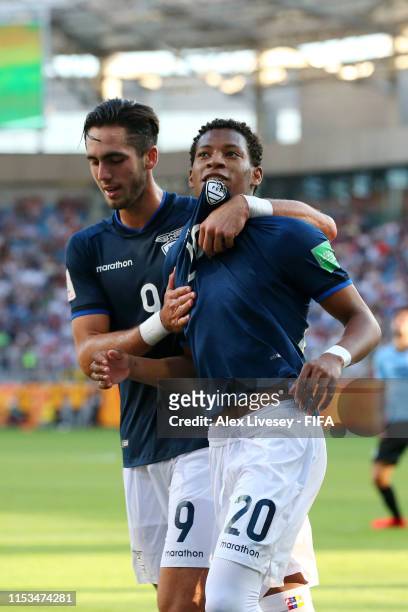 Gonzalo Plata of Ecuador celebrates with teammate Leonardo Campana after scoring his team's third goal during the 2019 FIFA U-20 World Cup Round of...