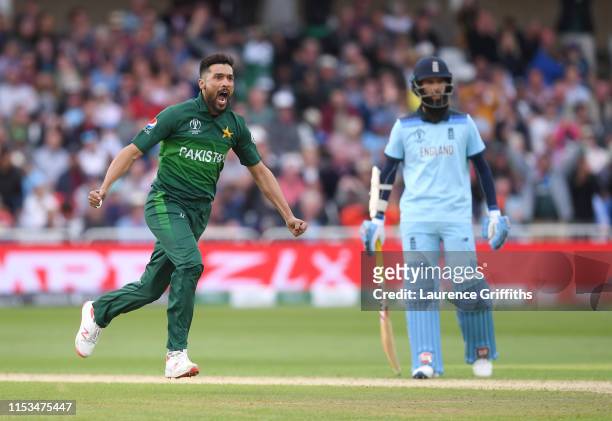 Mohammad Amir of Pakistan celebrates the wicket of Jos Butler of England during the Group Stage match of the ICC Cricket World Cup 2019 between...