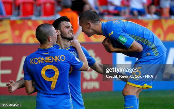 Serhii Buletsa of Ukraine celebrate with team mate Viktor Korniienko and Kyrylo Dryshliuk after he scores the 4th goal during the 2019 FIFA U-20...