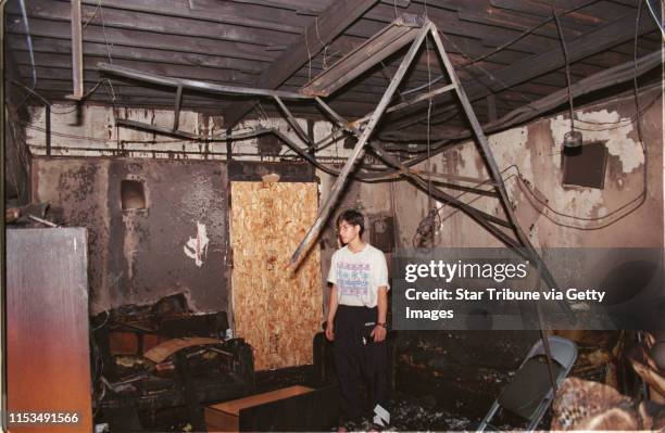 Christopher Phan, son of owner, viewed the damage in one of the up stairs apartments.