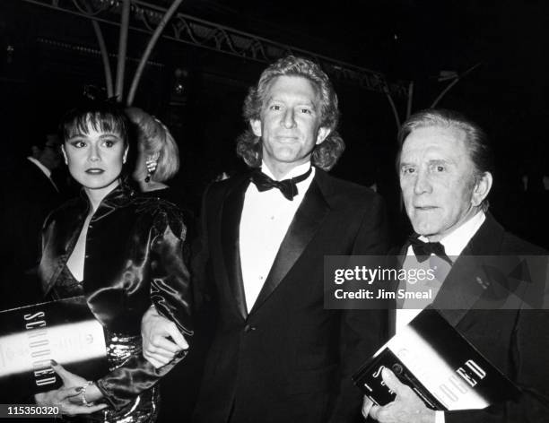 Peter Douglas with Wife and Kirk Douglas during World Premiere of "Scrooged" at Mann Chinese Theater in Hollywood, California, United States.