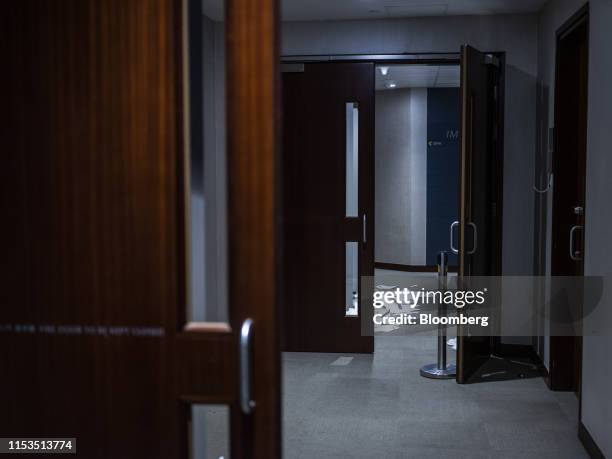 Ream of paper sits scattered in a corridor inside the Legislative Council building during a media tour in Hong Kong, China, on Wednesday, July 3,...