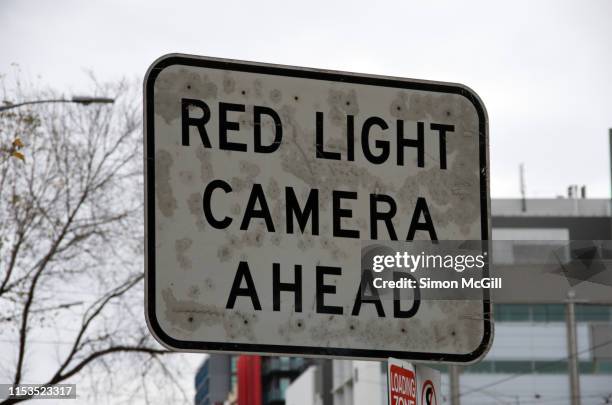 'red light camera' traffic warning sign - traffic light camera stock pictures, royalty-free photos & images