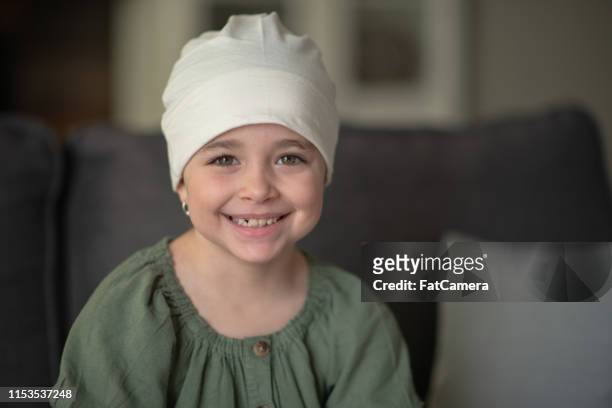 little girl with cancer - childhood cancer stock pictures, royalty-free photos & images