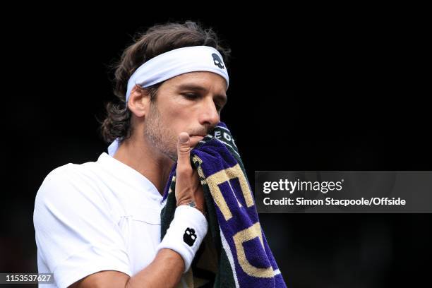 Feliciano Lopez looks dejected against Karen Khachanov during their Gentlemen's Singles 2nd Round match on Day 3 of The Championships - Wimbledon...