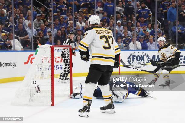 Brandon Carlo of the Boston Bruins shoots the puck past Jordan Binnington of the St. Louis Blues for a second period goal at 14:19 in Game Four of...