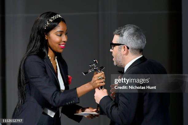 Jessica Williams and Brandon Maxwell appear onstage during the CFDA Fashion Awards at the Brooklyn Museum of Art on June 03, 2019 in New York City.