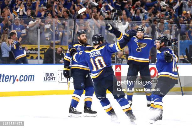 Brayden Schenn of the St. Louis Blues celebrates his empty-net goal in the third period at 18:31 against the Boston Bruins in Game Four of the 2019...