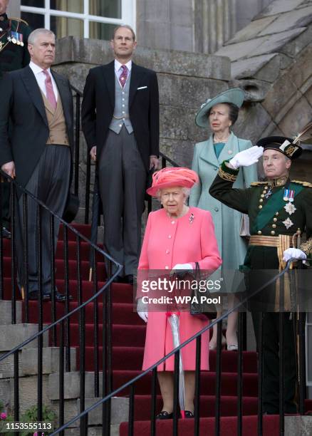 Queen Elizabeth II hosts a garden party with Princess Anne, Princess Royal , Prince Andrew, Earl of Inverness and Prince Edward, Earl of Forfar at...