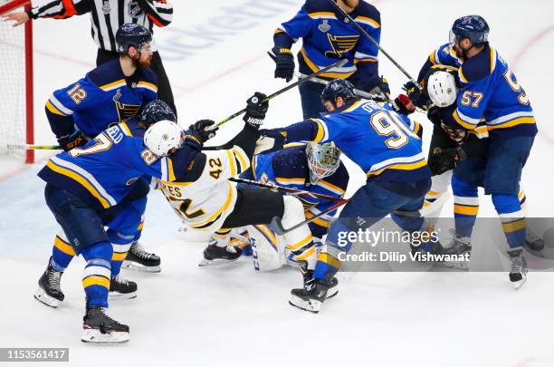 David Backes of the Boston Bruins and Alex Pietrangelo of the St. Louis Blues get tangled up in Game Four of the 2019 NHL Stanley Cup Final at...