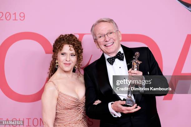 Bob Mackie poses with the Geoffrey Beene Lifetime Achievement Award and Bernadette Peters poses during Winners Walk during the CFDA Fashion Awards at...