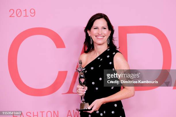 Lisa McKnight poses with Barbie's Award for Board of Tribute Award on the Winners Walk during the CFDA Fashion Awards at the Brooklyn Museum of Art...