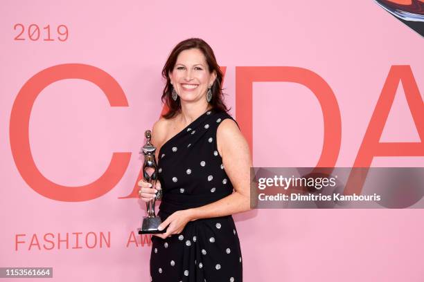 Lisa McKnight poses with Barbie's Award for Board of Tribute Award on the Winners Walk during the CFDA Fashion Awards at the Brooklyn Museum of Art...