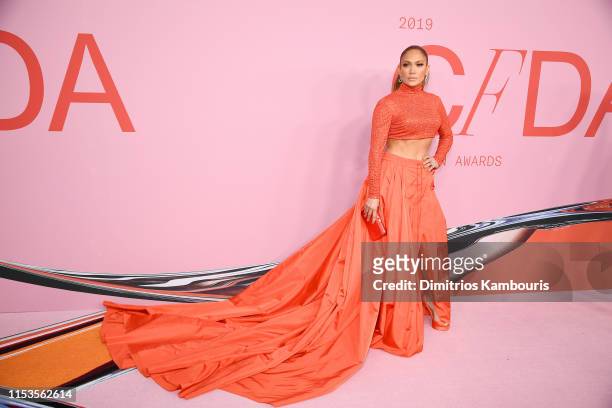 Jennifer Lopez poses with the Fashion Icon Award during Winners Walk during the CFDA Fashion Awards at the Brooklyn Museum of Art on June 03, 2019 in...