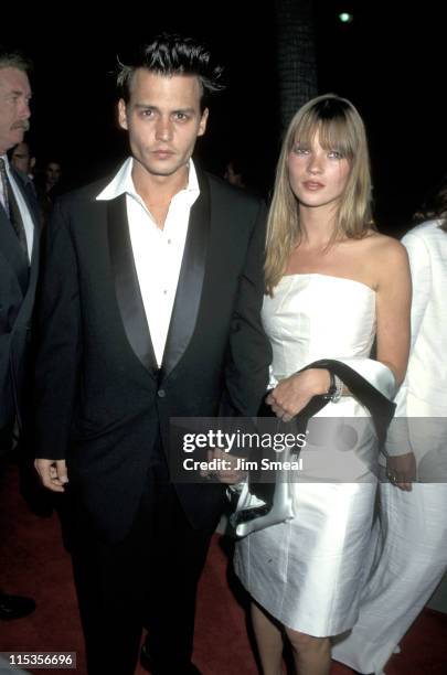 Johnny Depp and Kate Moss during "Don Juan De Marco" Beverly Hills Premiere at The Academy in Beverly Hills, California, United States.